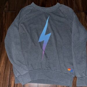 women’s aviator nation charcoal crewneck sweatshirt with blue bolt